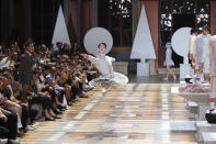 A dancer performs at the Thom Browne mens Spring-Summer 2020 fashion collection presented in Paris, Saturday, June 22 2019. (AP Photo/Michel Euler)