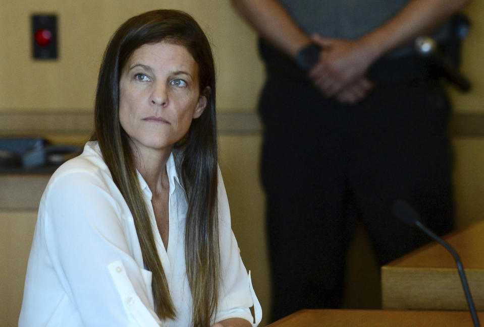 Michelle Troconis attends a hearing in Stamford Superior Court in Stamford, Conn., on Friday, June 28, 2019. The judge agreed to issue a no-contact order designed to keep her boyfriend Fotis Dulos and his attorney away from her and also granted permission for her to travel to a friend's home in New York state. Troconis and Dulos are charged with evidence tampering and hindering prosecution in connection with the May 24 disappearance of Fotis Dulos’s wife Jennifer Dulos. (Erik Trautmann /Hearst Connecticut Media via AP, Pool)