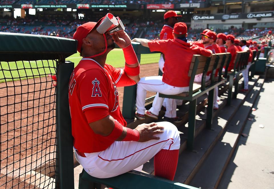 ANAHEIM, CA – OCTOBER 01: Luis Valbuena #18 of the Los Angeles Angels of Anaheim looks into the crowd with binoculars made from paper cups and tape during the game against the Seattle Mariners at Angel Stadium of Anaheim on October 1, 2017 in Anaheim, California. (Photo by Jayne Kamin-Oncea/Getty Images)