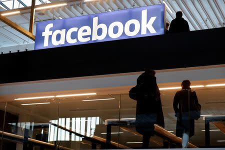 Facebook logo is seen at a start-up companies gathering at Paris' Station F in Paris, France, January 17, 2017. REUTERS/Philippe Wojazer