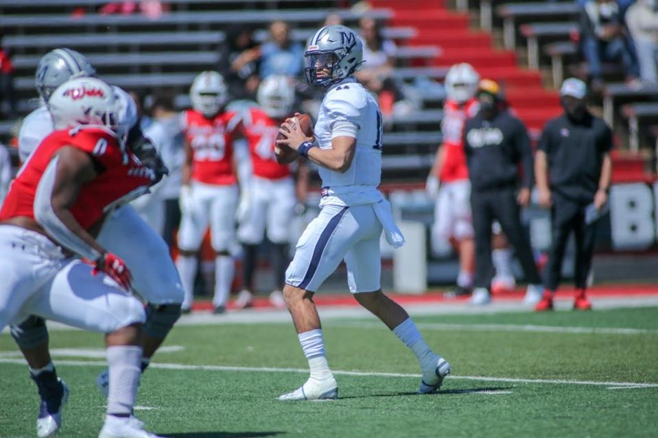 Monmouth quarterback Tony Muskett looks for a receiver during the Hawks' 48-19 win over Gardner-Webb on April 3, 2021, in Boiling Springs, N.C. Gardner-Webb visits Monmouth for a Big South clash Saturday.