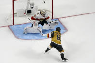 Vegas Golden Knights right wing Jonathan Marchessault (81) scores a goal on Florida Panthers goaltender Alex Lyon (34) during the third period of Game 2 of the NHL hockey Stanley Cup Finals, Monday, June 5, 2023, in Las Vegas. The Golden Knights defeated the Panthers 7-2 to take a 2-0 series lead. (AP Photo/John Locher)
