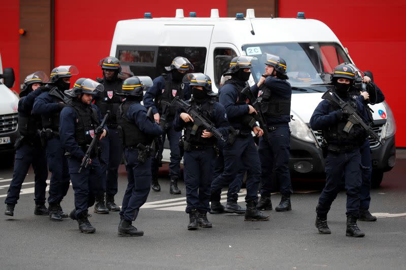 French police secure an area after a knife attack in a public park in Villejuif