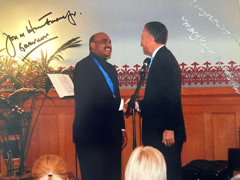 Emmanuel Shanthakumar, chef and owner of Royal India, shaking hands with former Utah Gov. Jon Huntsman Jr. at the Artist Awards on Sept. 19, 2007. Shanthakumar received a governor's medal. The photo is signed by Huntsman and former first lady of Utah Mary Kaye Huntsman. | Courtesy of Emmanuel Shanthakumar