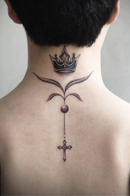 Cross tattoo on back <p>Jang Raeha</p>