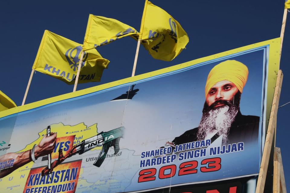 A mural features the image of late Sikh leader Hardeep Singh Nijjar, who was slain on the grounds of the Guru Nanak Sikh Gurdwara temple in June 2023 in Surrey (REUTERS)