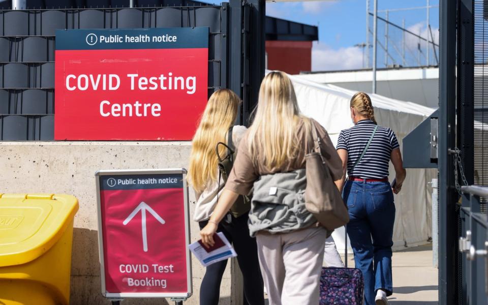 Passengers enter the Covid-19 testing centre at London Luton Airport on August 4  - Chris Ratcliffe/Bloomberg