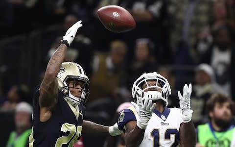 Los Angeles Rams wide receiver Brandin Cooks (12) catches a pass against New Orleans Saints cornerback P.J. Williams (26) during the second quarter in the NFC Championship game at Mercedes-Benz Superdome - Credit: USA TODAY