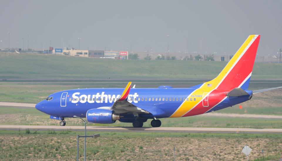 A Southwest Airlines jetliner taxis down a runway at Denver International Airport Friday, May 26, 2023, in Denver.