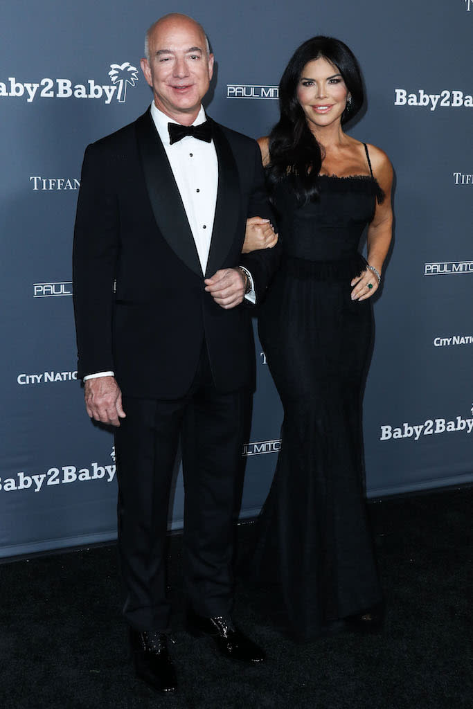 Lauren Sánchez, with Bezos, wears a black gown to the Baby2Baby 10-Year Gala. - Credit: Xavier Collin/Image Press Agency / MEGA
