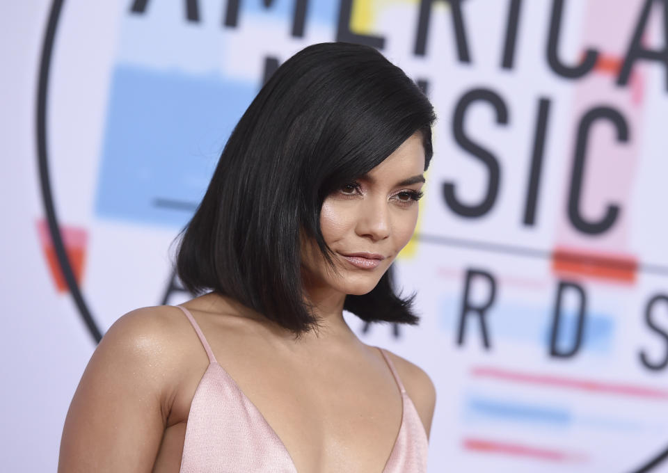 FILE - In this Oct. 9, 2018 file photo Vanessa Hudgens arrives at the American Music Awards at the Microsoft Theater in Los Angeles. The actress turns 32 on Dec. 14.(Photo by Jordan Strauss/Invision/AP, File)