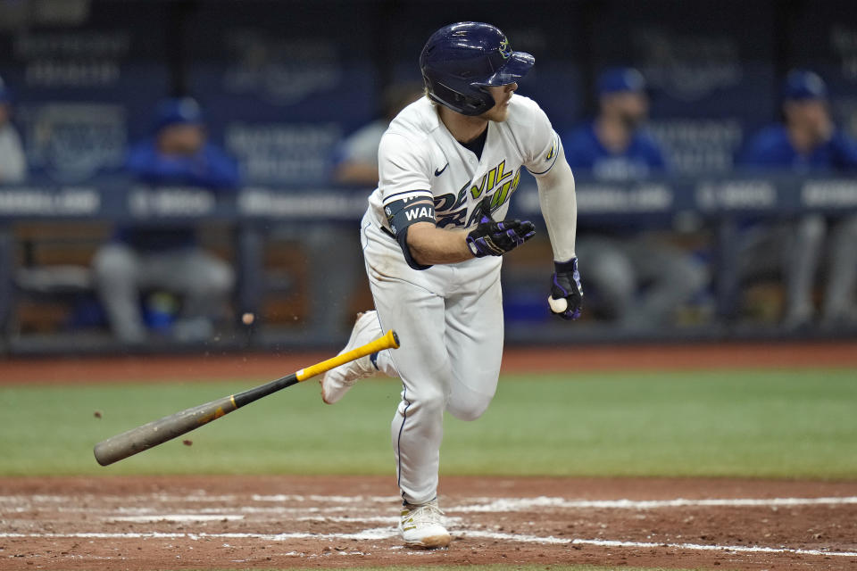 Tampa Bay Rays' Taylor Walls drops his bat after hitting a two-run single off Kansas City Royals relief pitcher Jose Cuas during the fifth inning of a baseball game Friday, June 23, 2023, in St. Petersburg, Fla. (AP Photo/Chris O'Meara)