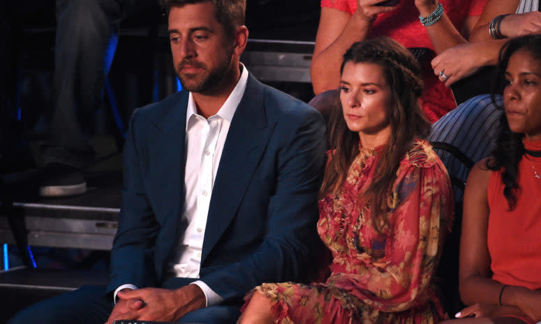 Aaron Rodgers and Danica Patrick at an awards show.