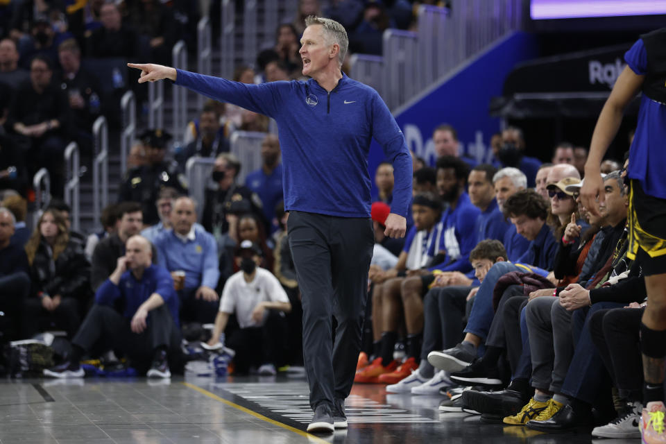 Golden State Warriors head coach Steve Kerr gestures to his players against the Los Angeles Lakers during the first half of an NBA basketball game in San Francisco, Saturday, Feb. 11, 2023. (AP Photo/Jed Jacobsohn)