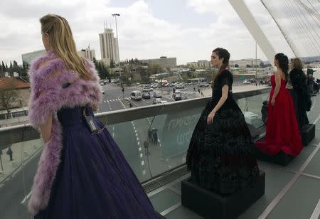 Opera singers, (from L to R) Alla Vasilevitsky, Avigail Gurtler, Yifat Weisskopf and Efrat Ashkenazi perform on the Bridge of Strings at the entrance to Jerusalem April 13, 2011. REUTERS/Ronen Zvulun