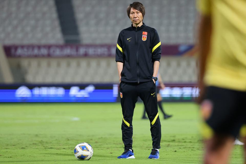 China's coach Li Tie looks on ahead of the 2022 Qatar World Cup Asian Qualifiers football match between China and Oman, at the Sharjah Football Stadium in the Emirati city, on November 11, 2021. (Photo by Giuseppe CACACE / AFP) (Photo by GIUSEPPE CACACE/AFP via Getty Images)