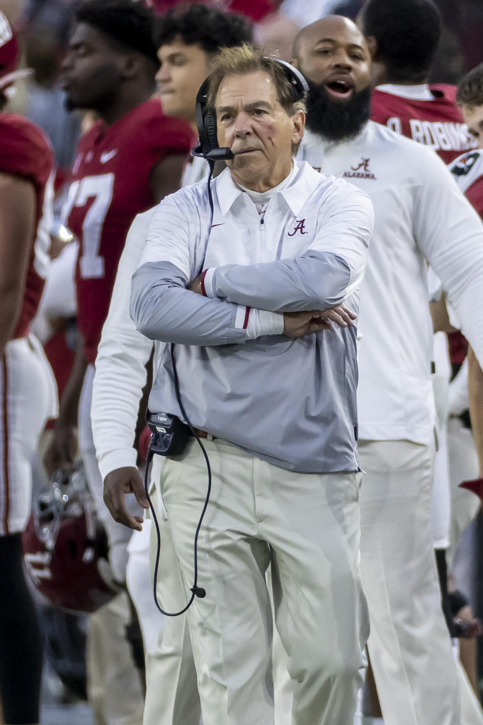 Alabama head coach Nick Saban paces the sideline with an injured face during the first half of an NCAA college football game against Auburn, Saturday, Nov. 26, 2022, in Tuscaloosa, Ala. (AP Photo/Vasha Hunt)