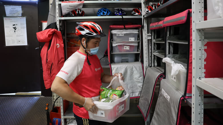 Worker preparing an order for delivery 