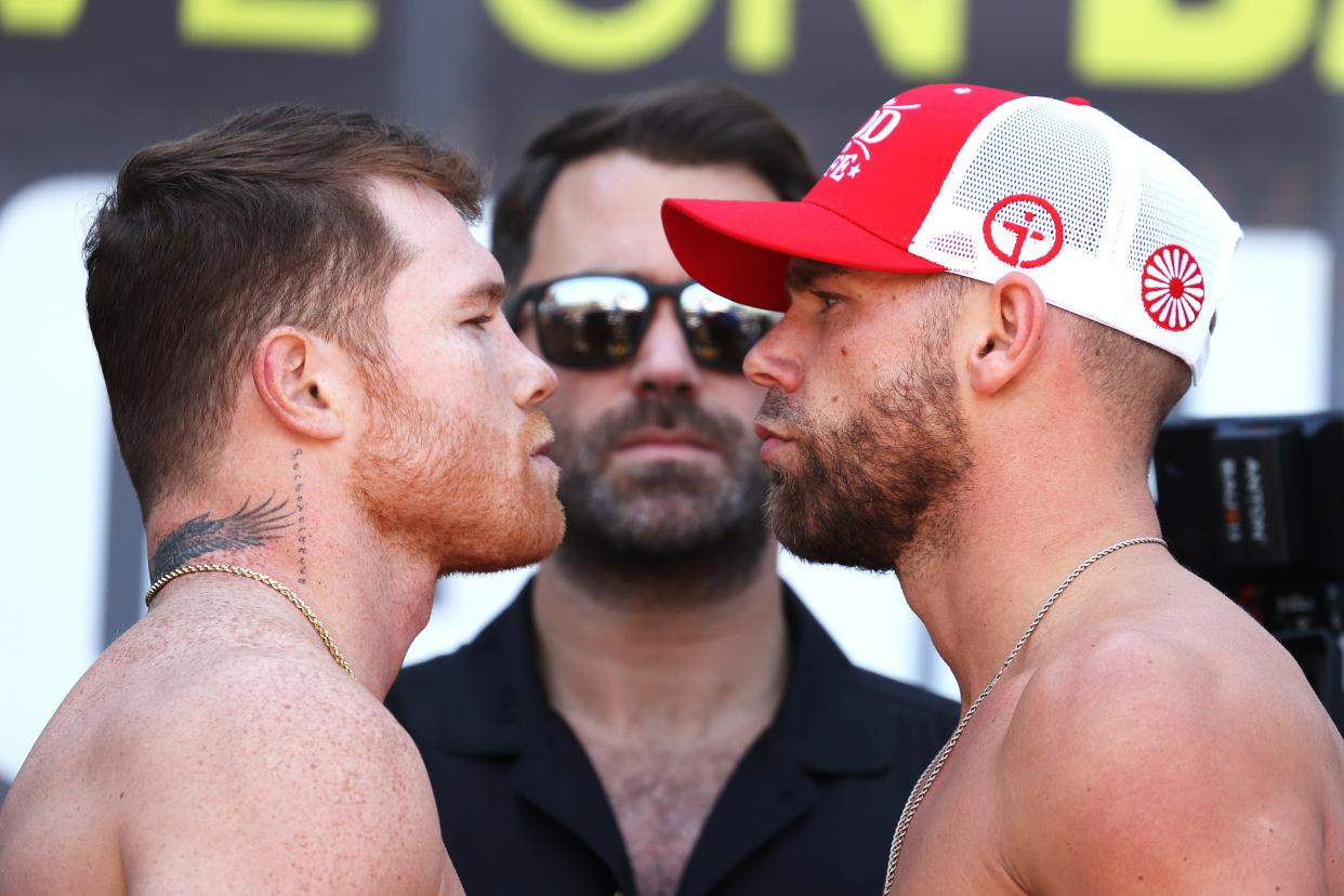 <p>Canelo Alvarez and Billy Joe Saunders lock horns on Saturday night</p> (Getty Images)