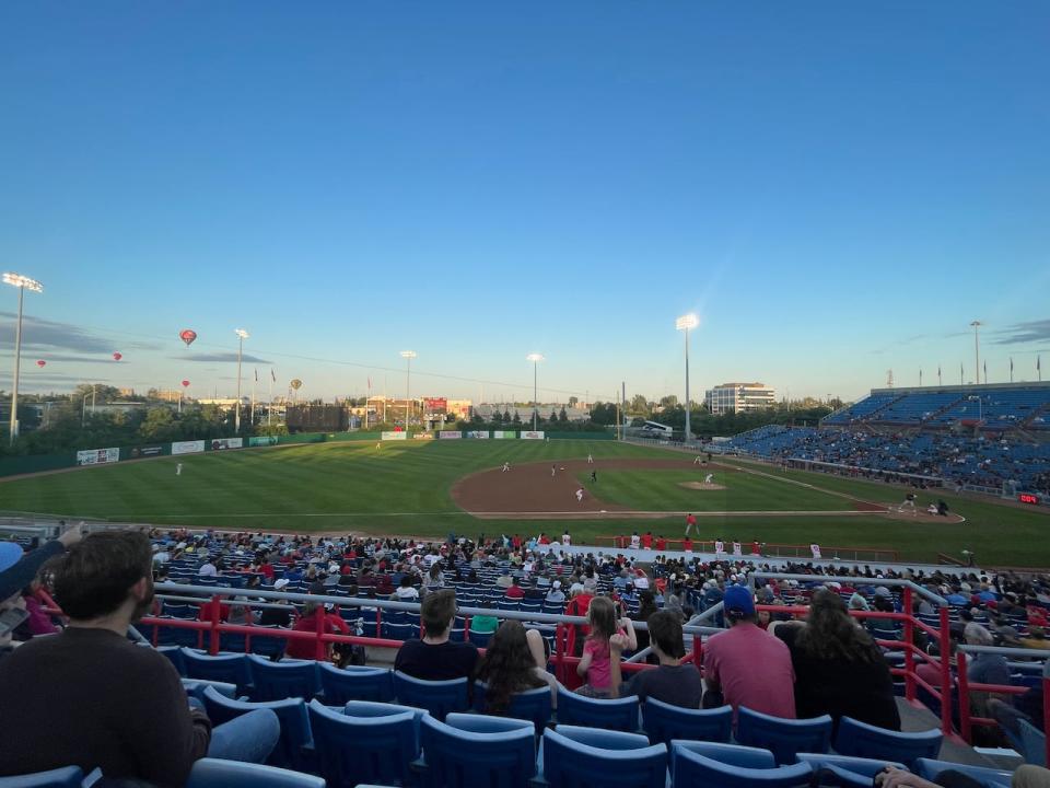 The Ottawa Titans play their final home game of 2023 at RCGT Park Aug. 31, 2023. The hot air balloons in the background are because of a festival in neighbouring Gatineau, Que.