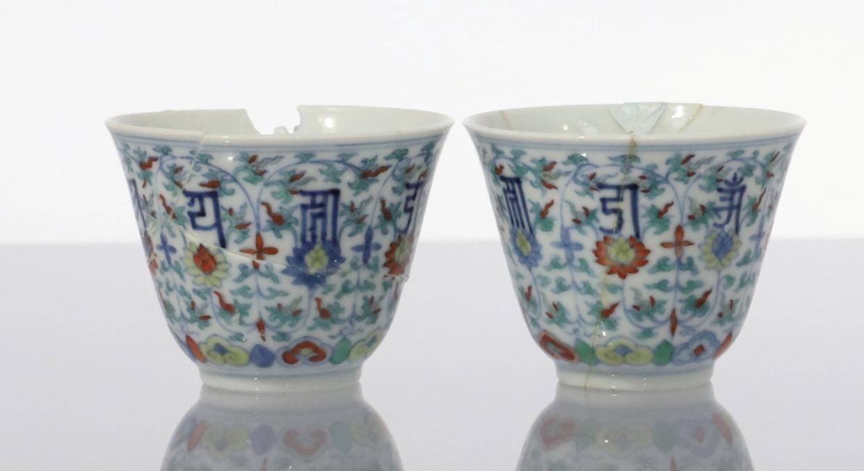 Two antique cups that were nearly thrown away sold at an auction for over £11,000 (SWNS)