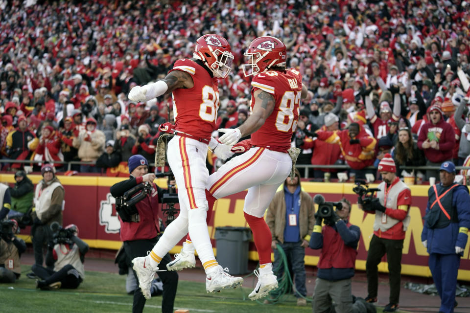 Kansas City Chiefs tight end Noah Gray, right, is congratulated by teammate Jody Fortson after catching a touchdown pass during the first half of an NFL football game against the Jacksonville Jaguars Sunday, Nov. 13, 2022, in Kansas City, Mo. (AP Photo/Ed Zurga)