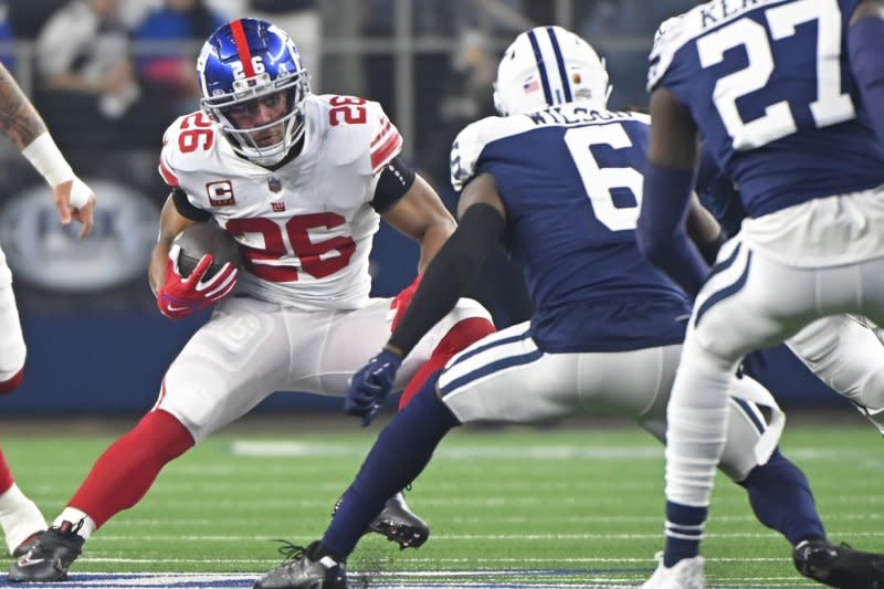 New York Giants running back Saquon Barkley (L) totaled the fourth-most rushing yards (1,653) in the NFL last season. File Photo by Ian Halperin/UPI