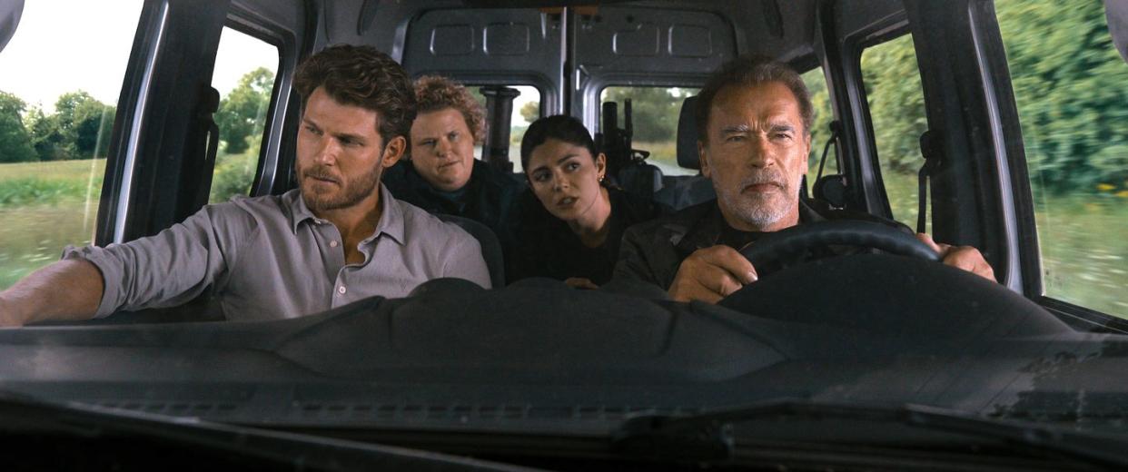 fubar l to r travis van winkle as aldon reece, fortune feimster as roo russell, monica barbaro as emma brunner, arnold schwarzenegger as luke brunner in episode 107 of fubar cr courtesy of netflix © 2023