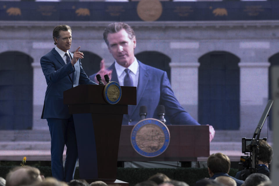 CORRECTS SPELLING OF SURNAME TO NEWSOM - Governor Gavin Newsom speaks during his inauguration in the Plaza de California in Sacramento, Calif., Friday, Jan. 6, 2023. (AP Photo/José Luis Villegas)