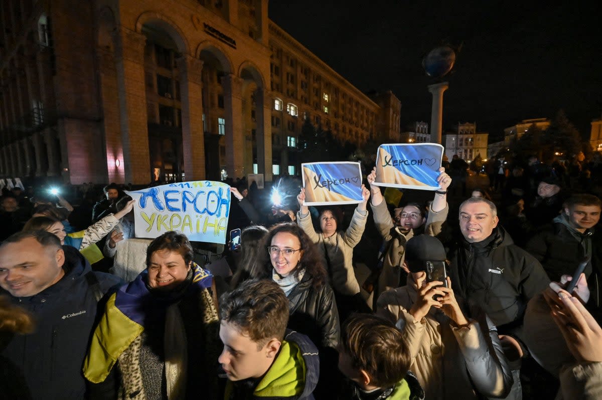 People gather in Kyiv’s Maidan square to celebrate the liberation of Kherson (AFP via Getty Images)