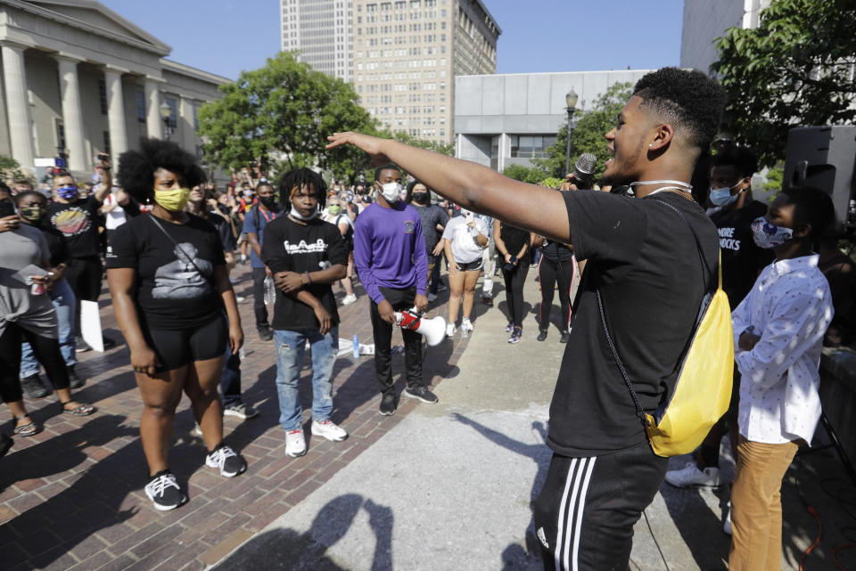 Sean Ali Waddell speaks during a protest over the deaths of George Floyd and Breonna Taylor, Tuesday, June 2, 2020, in Louisville, Ky. Floyd died after he was restrained by Minneapolis police on May 25. Taylor, a black woman, was fatally shot by police in her home in March. (AP Photo/Darron Cummings)