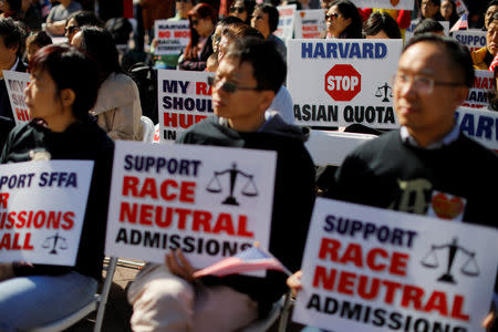 Supporters attend the "Rally for the American Dream - Equal Education Rights for All," ahead of the start of the trial in a lawsuit accusing Harvard University of discriminating against Asian-American applicants, in Boston, Massachusetts, U.S., October 14, 2018. REUTERS/Brian Snyder