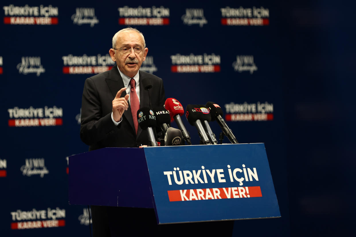 Kemal Kilicdaroglu at the microphone, at a podium marked, in Turkish: For Turkey, Decide!