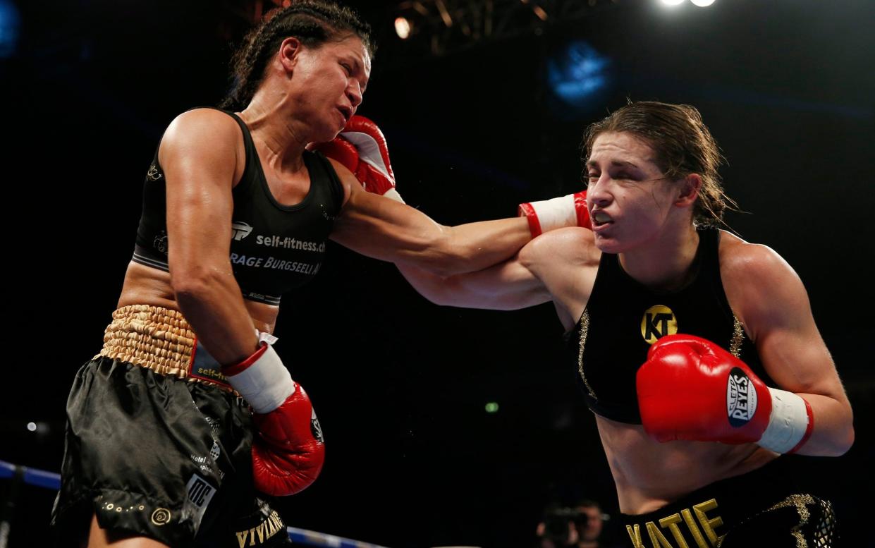 Viviane Obenauf (left) fighting Katie Taylor at Manchester Arena in 2016 - Andrew Couldridge/ Action Images via Reuters