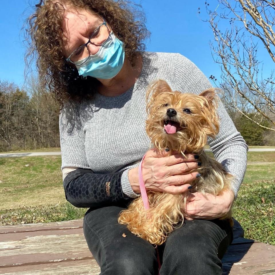 Veterinarian Dr. Karen Fox reunites with her Yorkie, Connor, March 4, 2021, at Metro Animal Control 13 years after Connor was stolen from Fox's front yard in Donelson.
