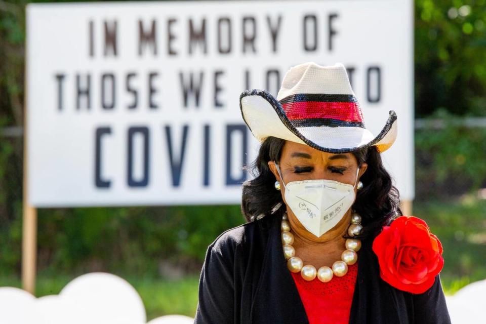 Congresswoman Frederica Wilson bows her head in prayer during an event on Nov. 24, 2020, to unveil an expanded cemetery in Liberty City’s Simonoff Park, in memory of those lost to the coronavirus.