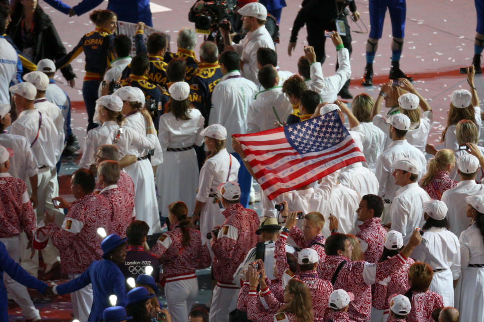 Athletes parade through the stadium during the Closing Ceremony on Day 16 of the London 2012 Olympic Games at Olympic Stadium on August 12, 2012 in London, England. (Photo by Feng Li/Getty Images)