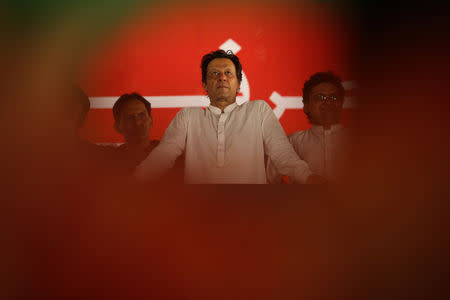 Imran Khan looks on during a campaign meeting ahead of general elections in Islamabad, Pakistan, July 21, 2018. REUTERS/Athit Perawongmetha/Files