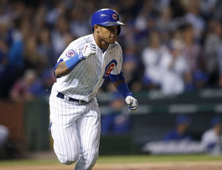 Cubs cut Russell year after domestic violence ban