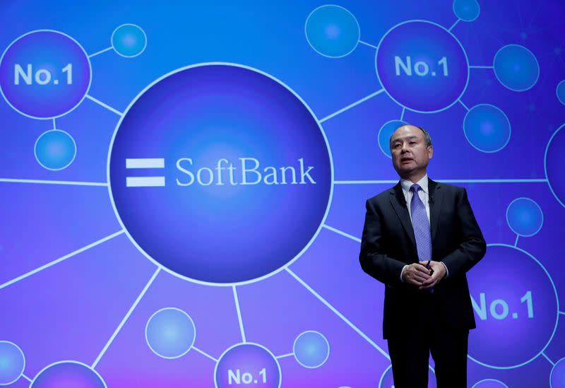 FILE PHOTO: Japan's SoftBank Group Corp Chief Executive Masayoshi Son attends a news conference in Tokyo, Japan