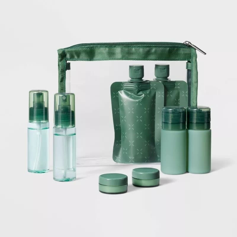 the full set of dark green travel toiletry items