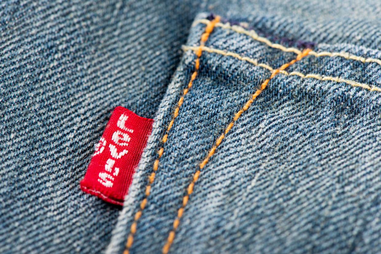 Closeup of red label on the back pocket of Levi's denim jeans