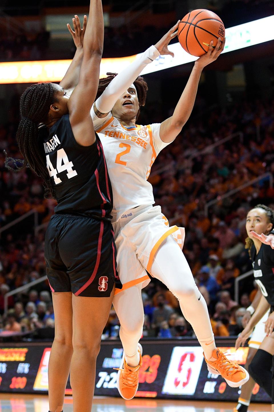 Tennessee forward Alexus Dye (2) shoots a layup past Stanford forward Kiki Iriafen (44) during a game between Tennessee and Stanford at Thompson-Boling Arena in Knoxville, Tenn. on Saturday, Dec. 18, 2021.
