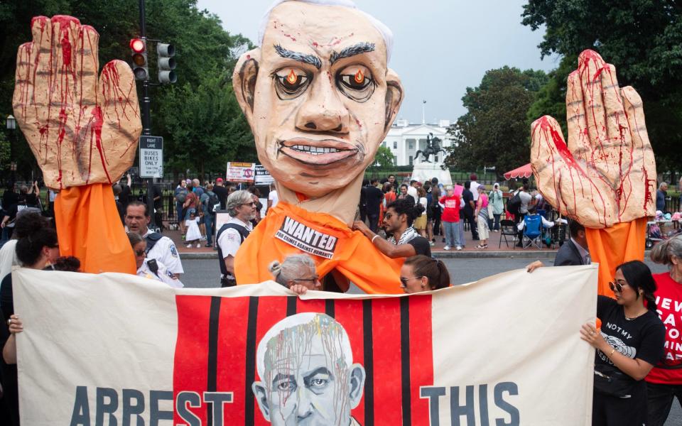 Gaza protestors with an effigy of Israeli Prime Minister Benjamin Netanyahu protest near the White House