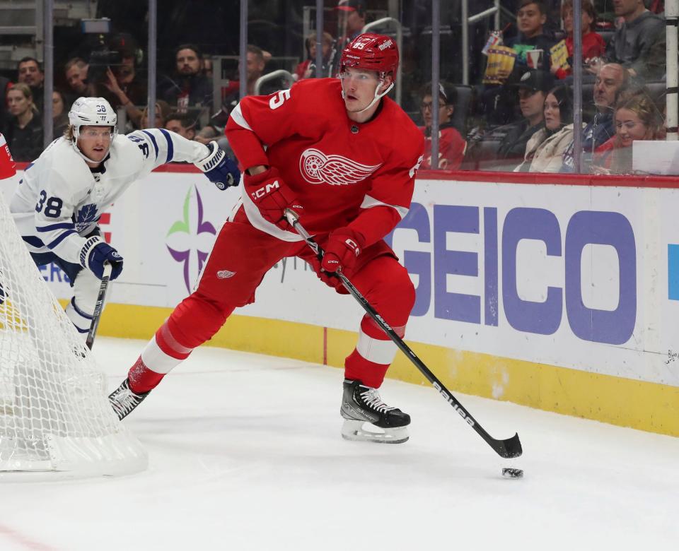 Detroit Red Wings left wing Elmer Soderblom (85) skates against Toronto Maple Leafs defenseman Rasmus Sandin (38) during first period action Friday, October 7, 2022.