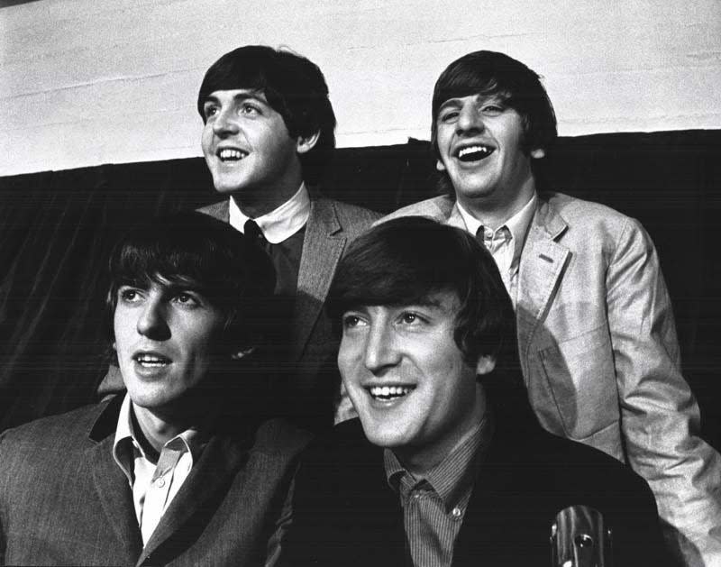 The Beatles came to Detroit to give two concerts at Olympia Stadium in 1964.  Clockwise from right foreground: John Lennon, George Harrison, Paul McCartney and Ringo Starr. 