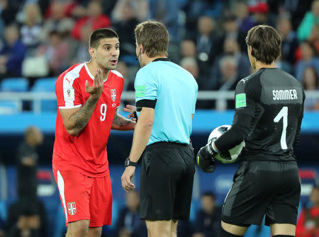 Soccer Football - World Cup - Group E - Serbia vs Switzerland - Kaliningrad Stadium, Kaliningrad, Russia - June 22, 2018 Serbia's Aleksandar Mitrovic talks to referee Felix Brych REUTERS/Mariana Bazo