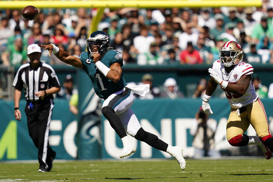 Philadelphia Eagles quarterback Jalen Hurts (1) passes during the first half of an NFL football game against the San Francisco 49ers on Sunday, Sept. 19, 2021, in Philadelphia. (AP Photo/Matt Slocum)