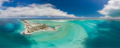   <span class="attribution"><a class="link " href="https://www.shutterstock.com/image-photo/panoramic-aerial-shot-christmas-island-lagoon-1404574331?src=5twBbg98Obegn9ptZhZLow-1-2&studio=1" rel="nofollow noopener" target="_blank" data-ylk="slk:RWBrooks/Shutterstock.com;elm:context_link;itc:0;sec:content-canvas">RWBrooks/Shutterstock.com</a></span>