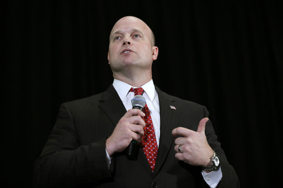 FILE - In this April 11, 2014, file photo, Iowa Senate candidate Matt Whitaker speaks during the Iowa Republican Party's annual Lincoln Day dinner in Cedar Rapids, Iowa. A GOP TV spot comparing castrating hogs to cutting spending, and Democrat Bruce Braley’s comment that lawyers like him are better suited to serve on the Senate Judiciary Committee than “an Iowa farmer” like U.S. Sen. Charles Grassley, have raised the Iowa’s open Senate seat on the GOP’s list of winnable races in the 2014 elections. (AP Photo/Charlie Neibergall, File)